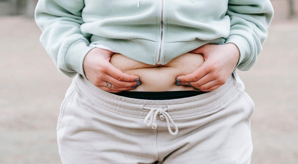 How To Get Rid of Menopausal Belly Fat: 12 Tips and Tricks To Help Shrink Your Waistline