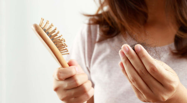 Endometriosis and Hair Loss: How They’re Connected & What You Can Do To Help
